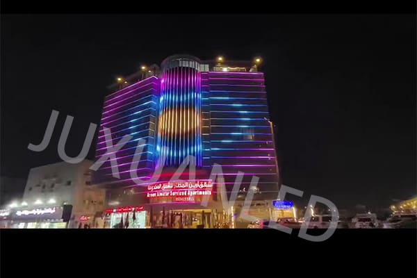 A building facade with a completed, dynamic lighting effect